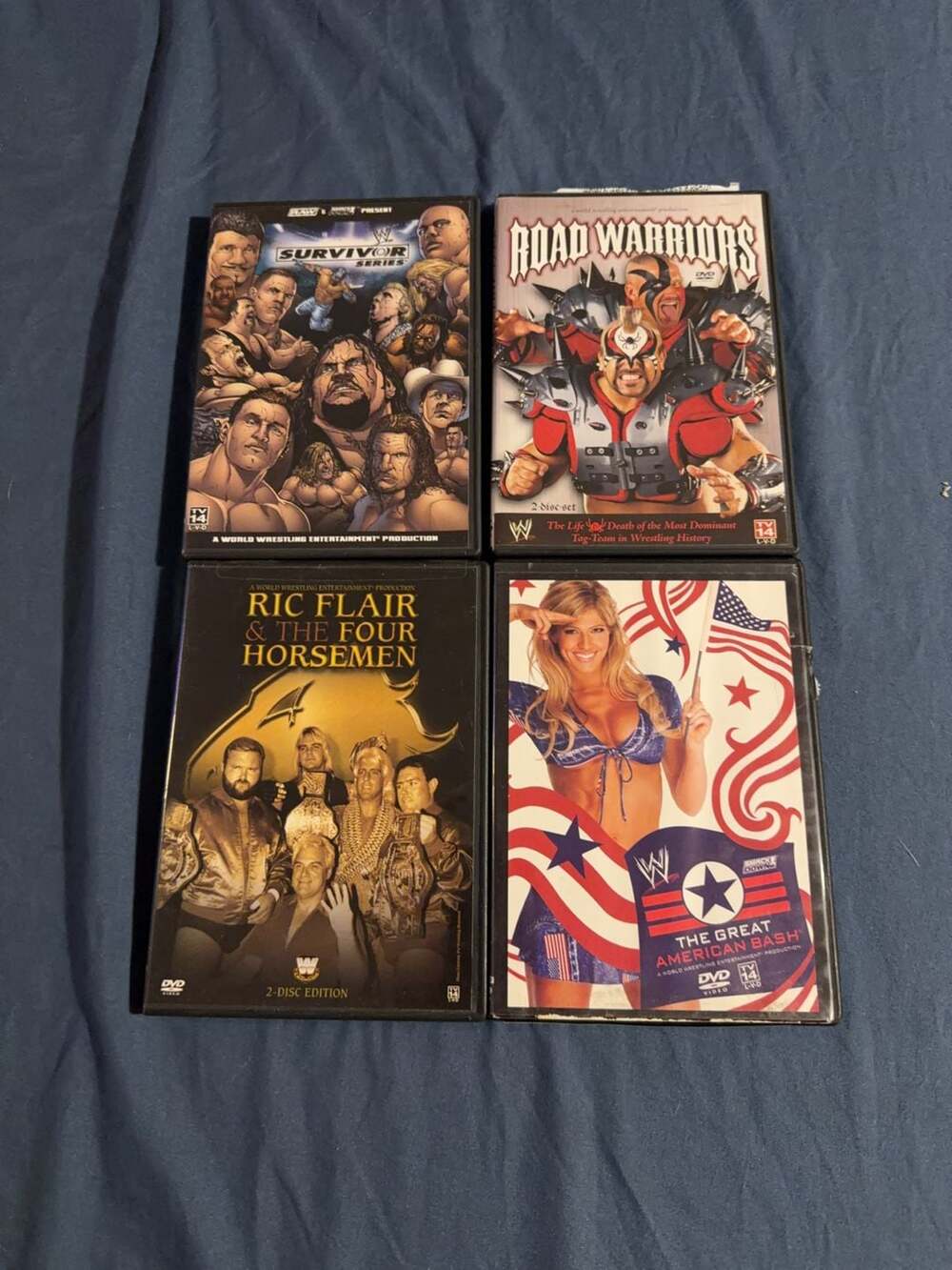 Lot of 4 WWE Wrestling DVDs: Survivor Series, Road Warriors, Ric Flair & The Fou